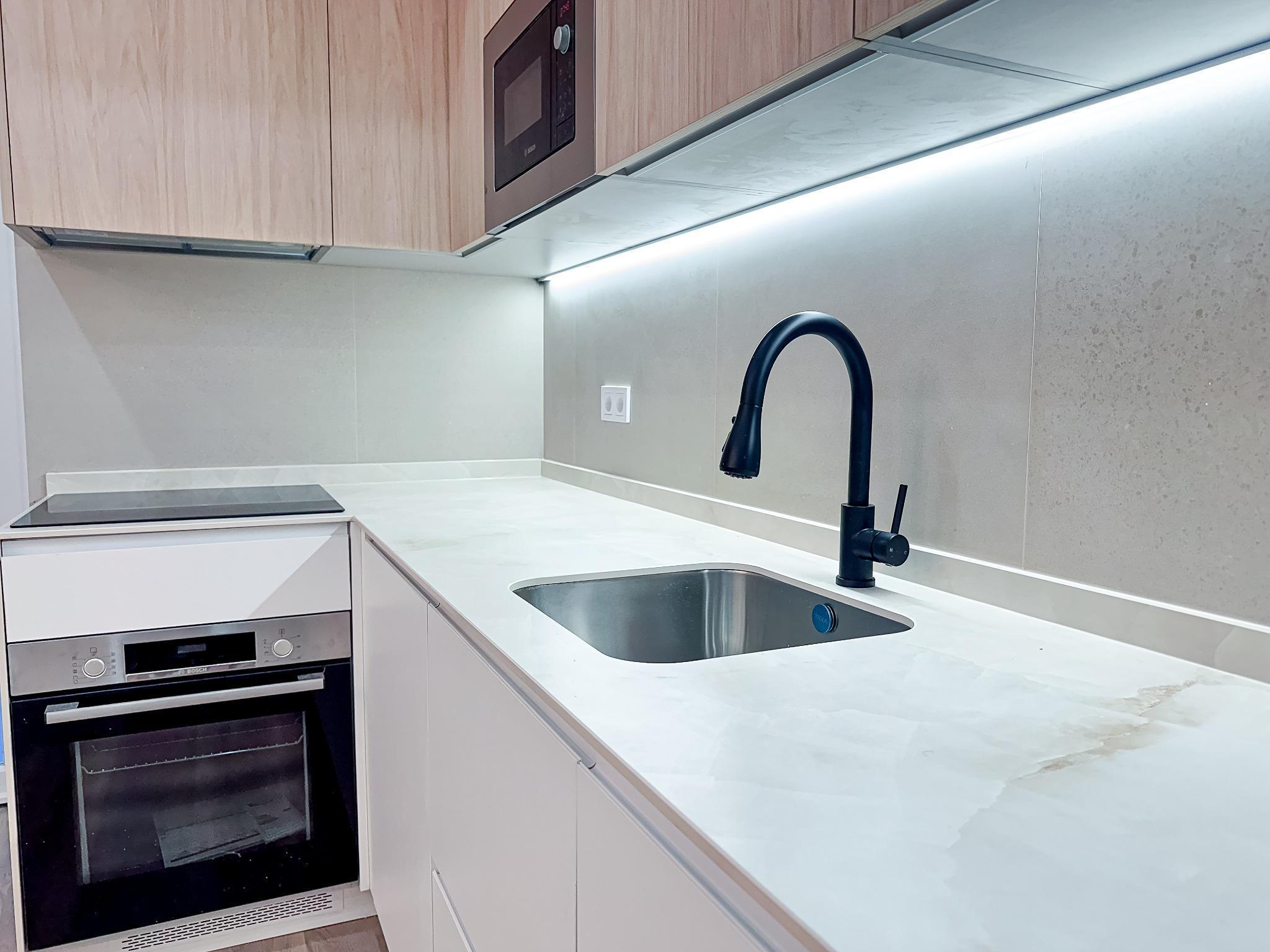 Cocina reformada con carpintería a medida